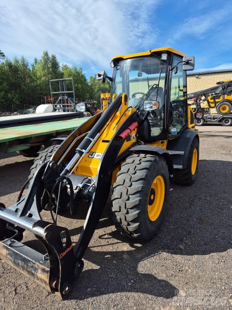 JCB 409 لوادر بعجل