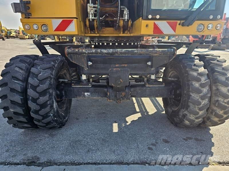 CAT M320F حفارات بعجل