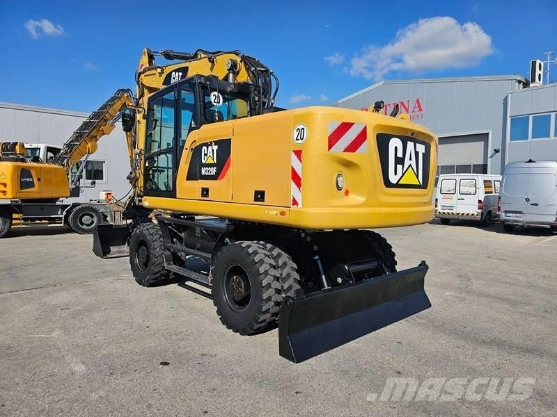 CAT M320F حفارات بعجل