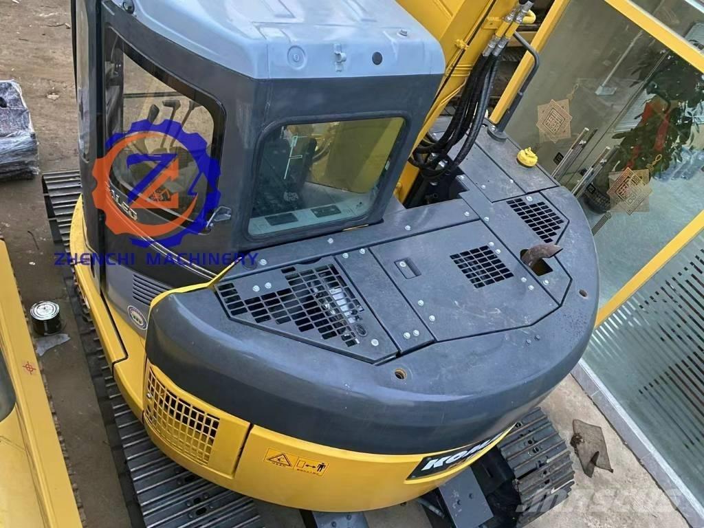 Komatsu PC 128 US حفارات وسط 7 طن - 12 طن