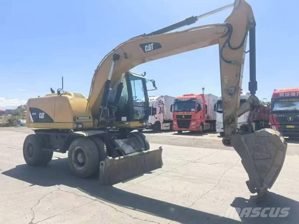 CAT M315D2 حفارات بعجل
