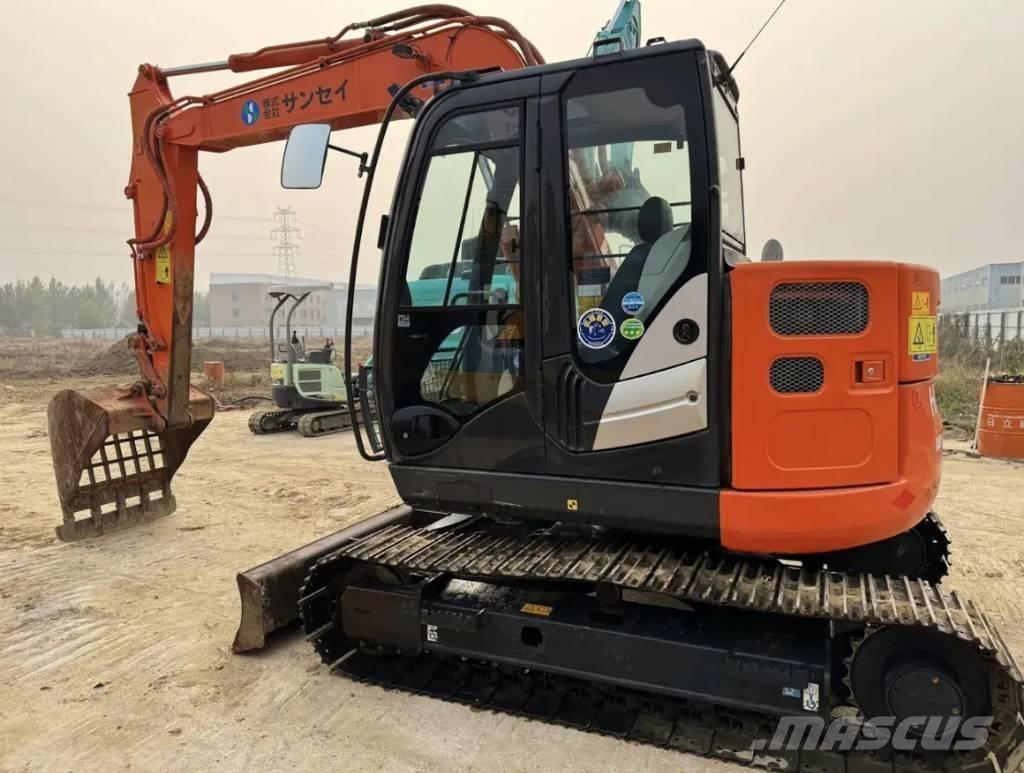 Hitachi ZX 75 US حفارات وسط 7 طن - 12 طن