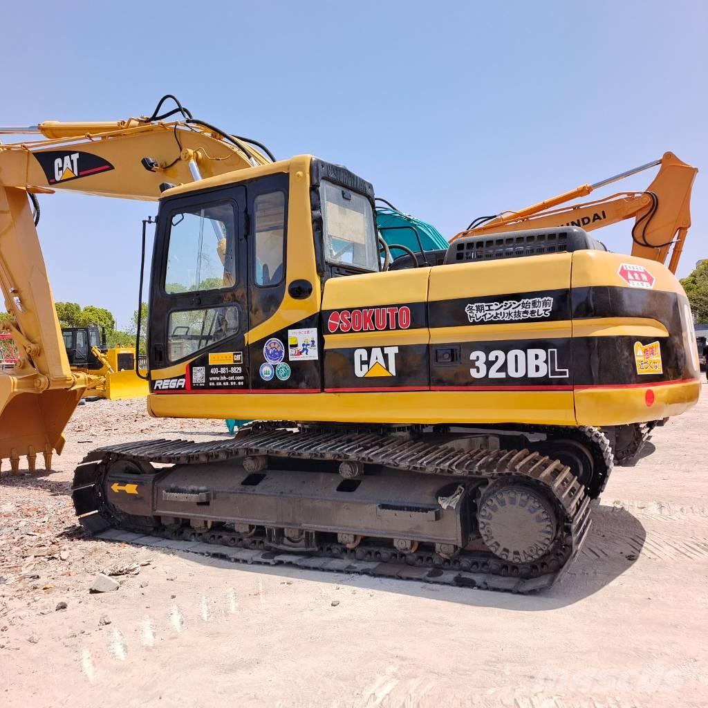 CAT 320 B L حفارات زحافة