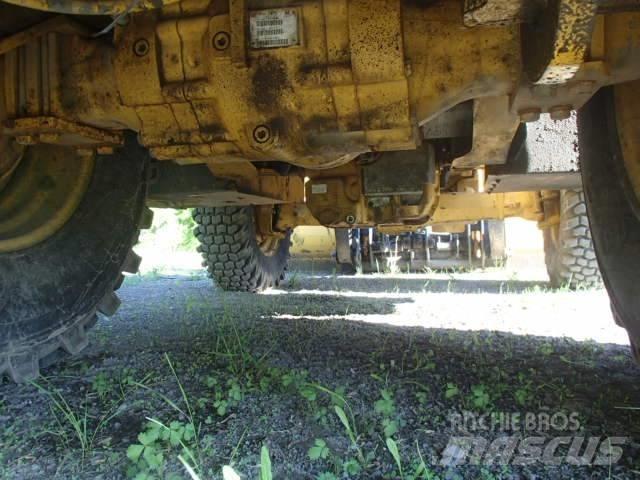 DEERE 410J لوادر ذات جرافات عكسية