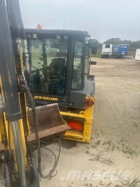 New Holland 110 D لوادر ذات جرافات عكسية
