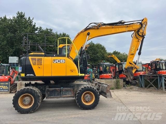 JCB JS 145 W حفارات بعجل
