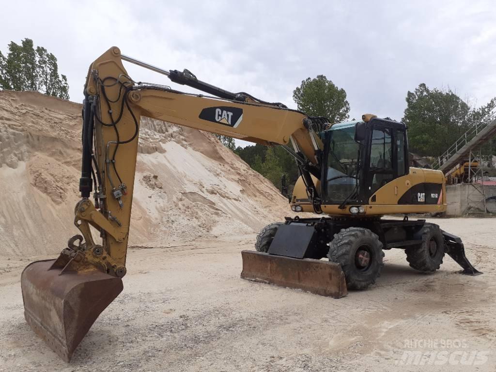 CAT M 316 D حفارات بعجل