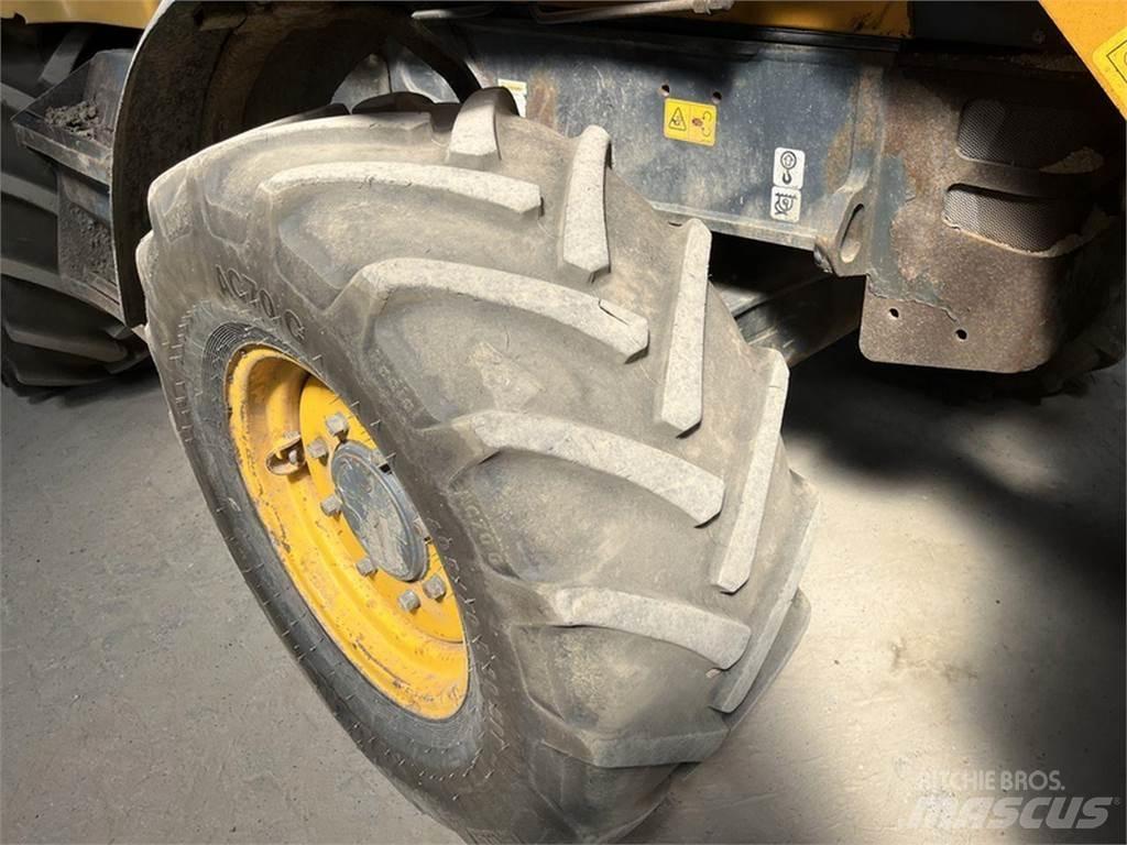 Fermec 860 لوادر ذات جرافات عكسية