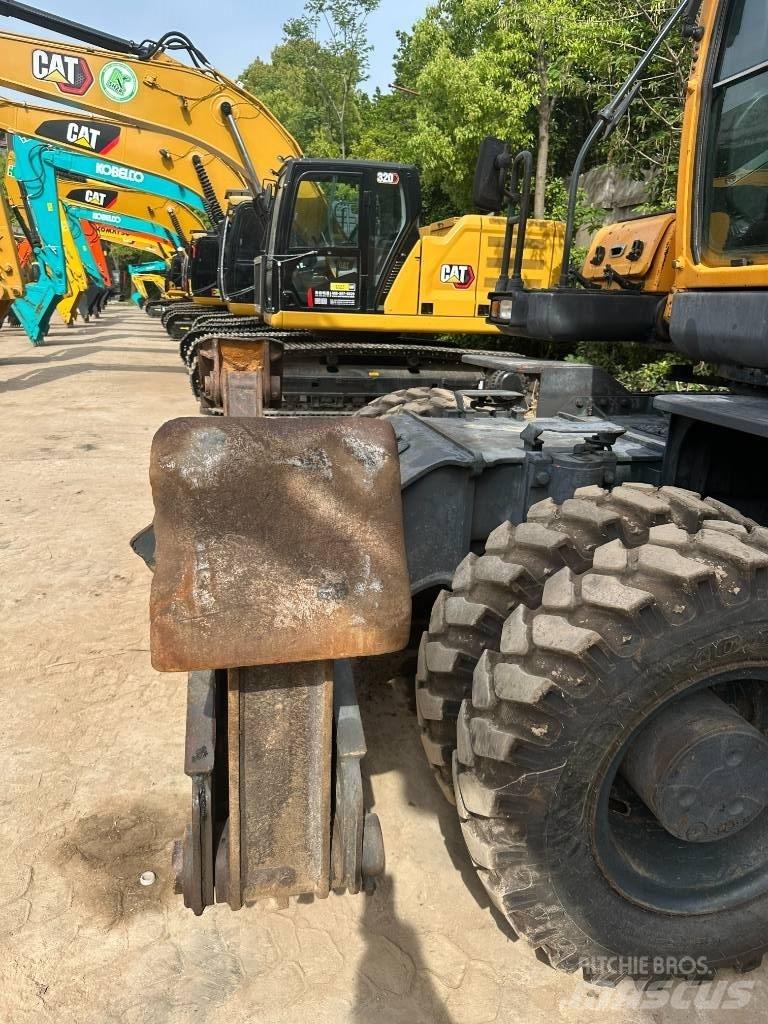 Hyundai R210W-9 حفارات بعجل