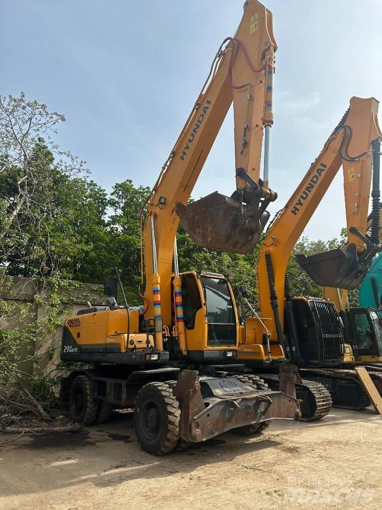 Hyundai R210W-9 حفارات بعجل