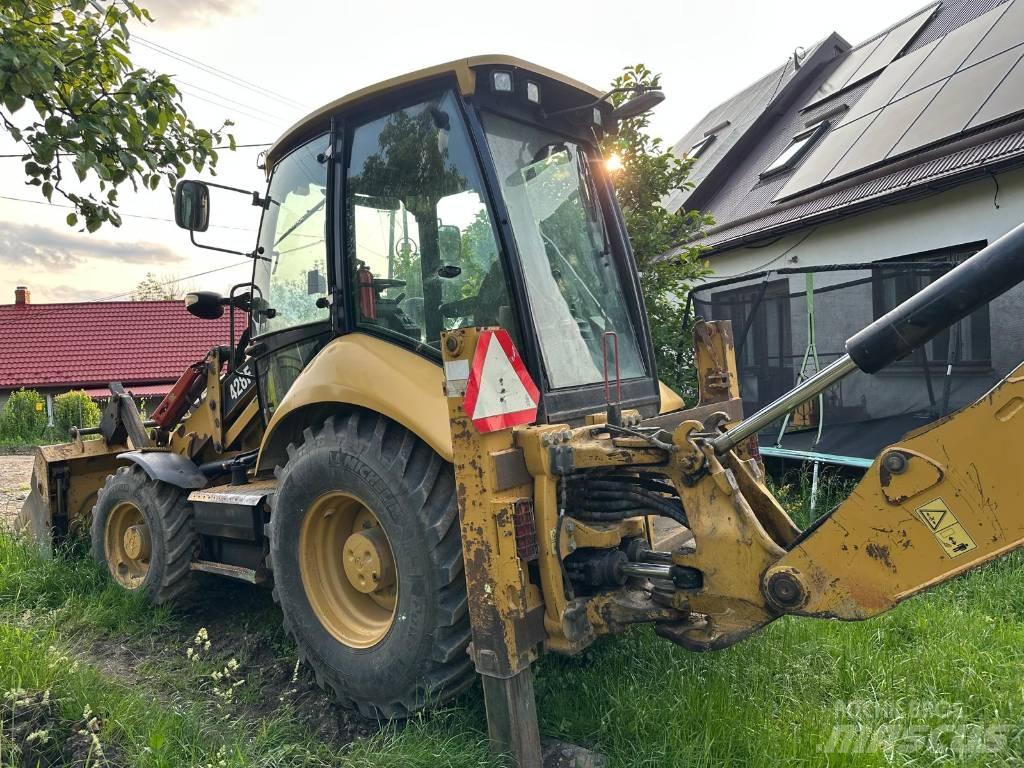CAT 428 F لوادر ذات جرافات عكسية