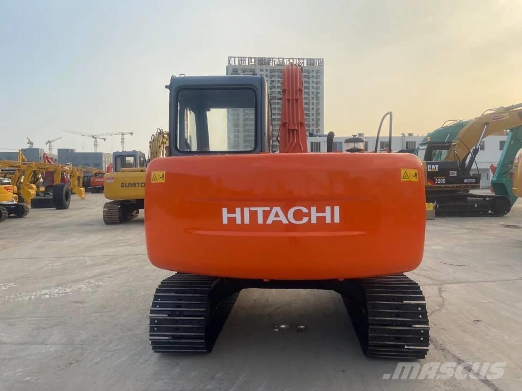 Hitachi EX60 حفارات زحافة