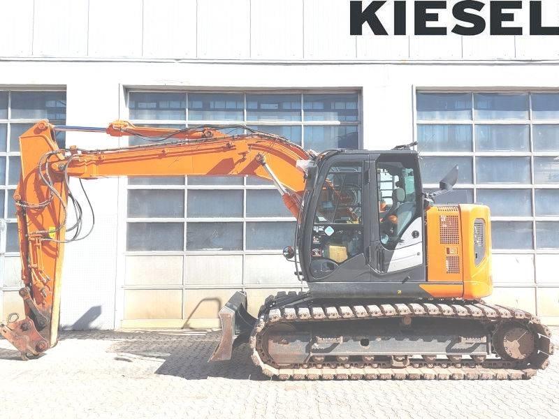 Hitachi ZX 135 US-6 حفارات زحافة