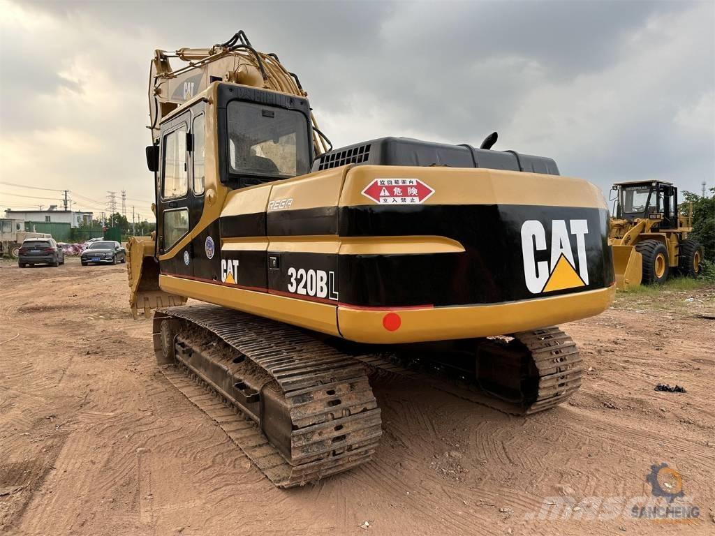 CAT 320 B L حفارات زحافة
