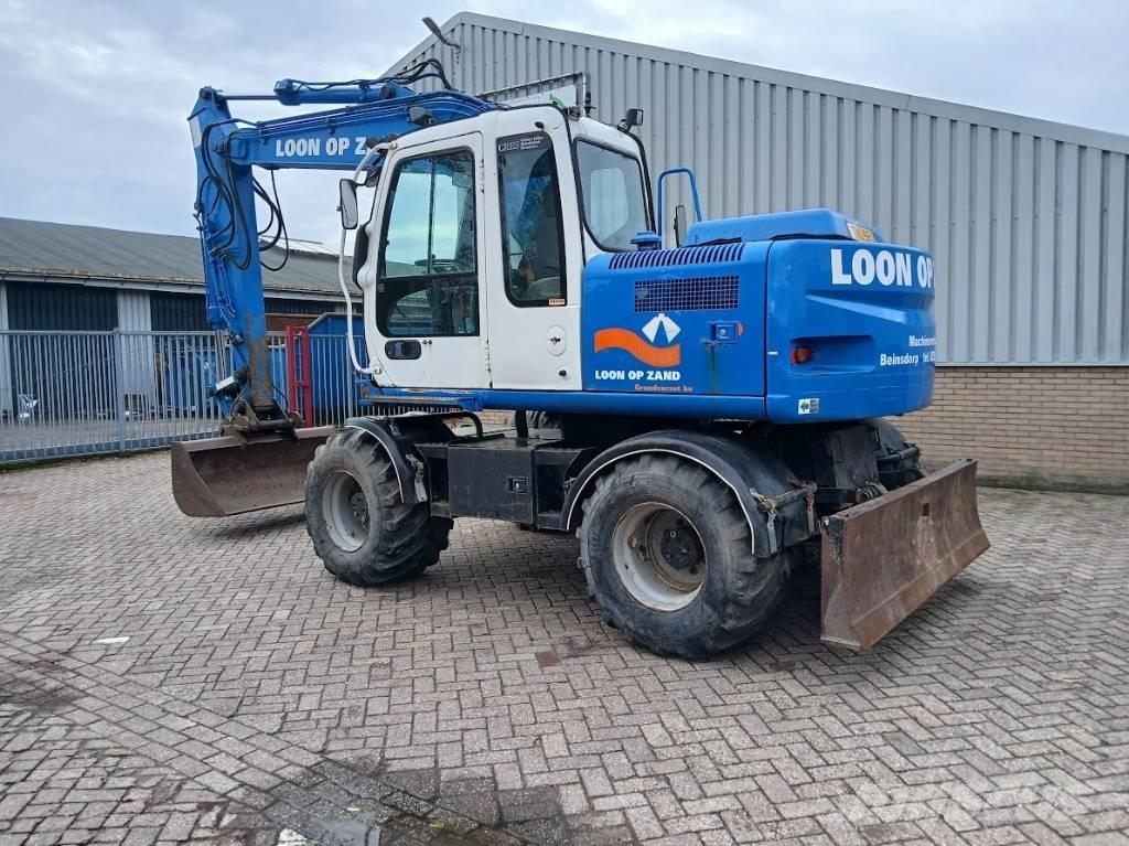 Hitachi ZX 130 W حفارات بعجل