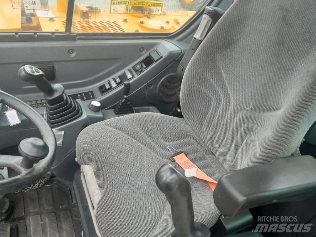Hyundai R55 W-9 حفارات بعجل