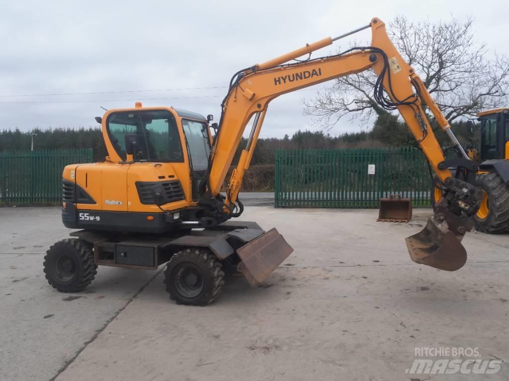 Hyundai R55 W-9 حفارات بعجل