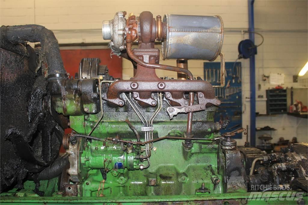 John Deere 6400 الجرارات