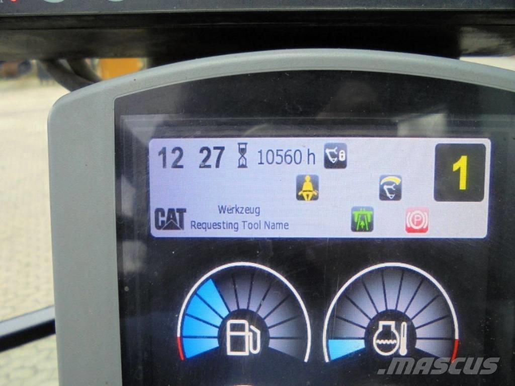 CAT M 317 حفارات بعجل