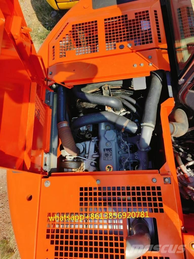 Hitachi ZX 135 US حفارات زحافة