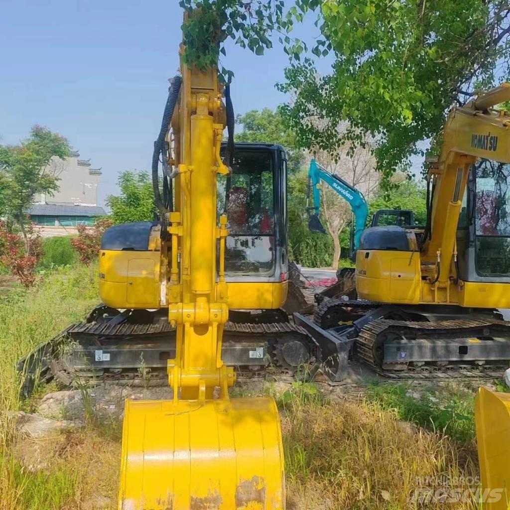 Komatsu PC 78 US حفارات وسط 7 طن - 12 طن