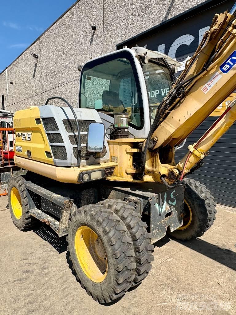New Holland MH 2.6 حفارات بعجل