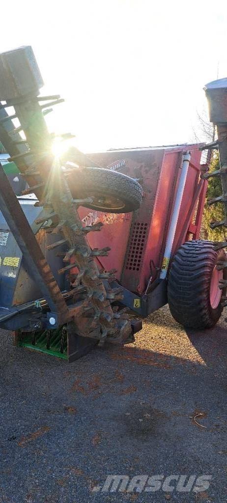 Juko KK 4 أَدَاةٌ لِجمع الحجارة