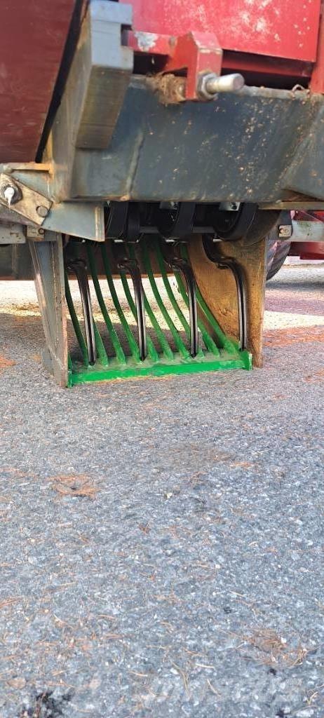 Juko KK 4 أَدَاةٌ لِجمع الحجارة