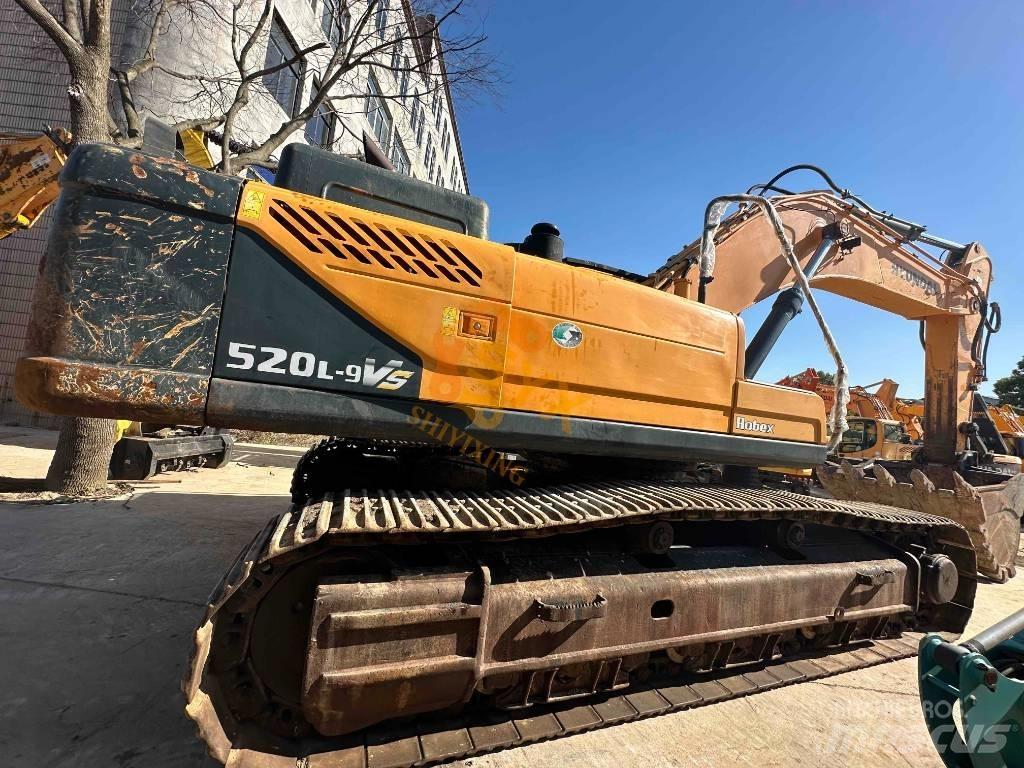 Hyundai Robex 520 VS حفارات زحافة