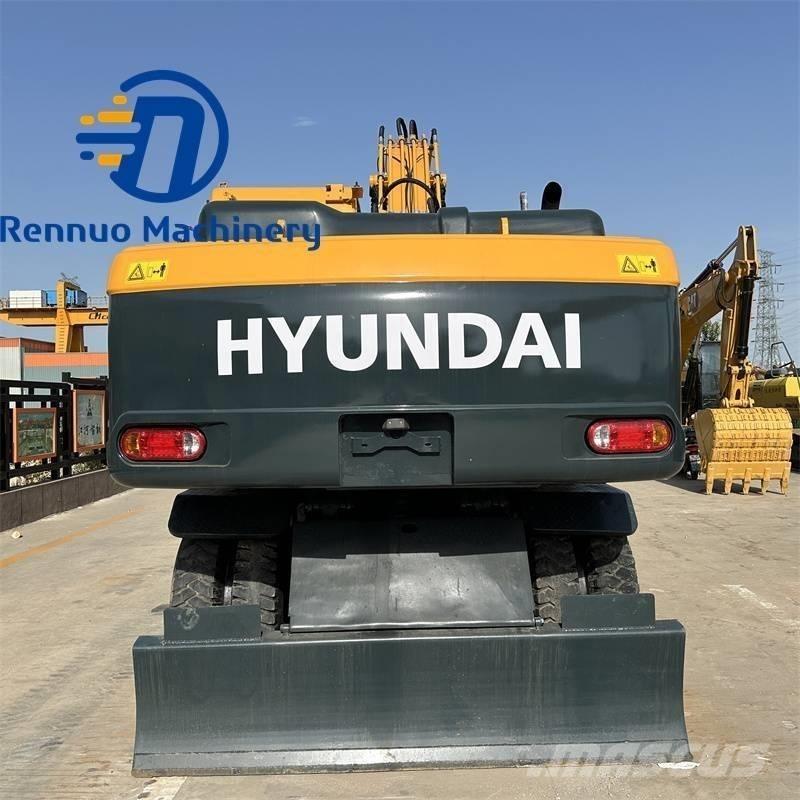 Hyundai 210W-9 حفارات بعجل
