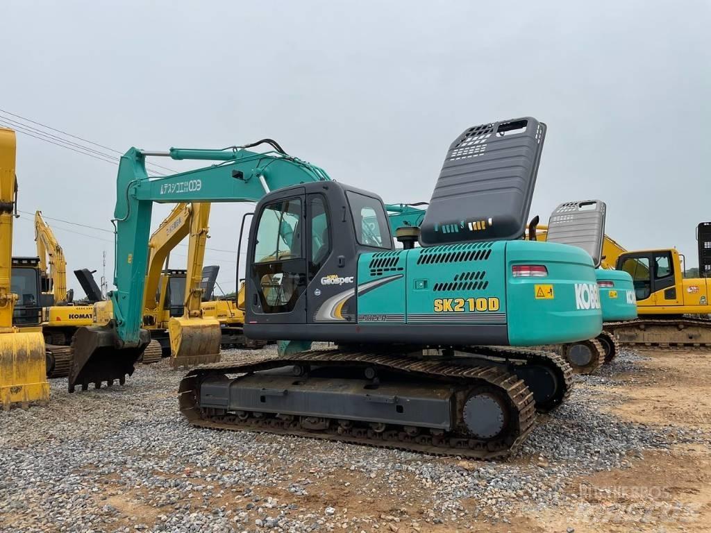 Kobelco SK 210 D حفارات وسط 7 طن - 12 طن