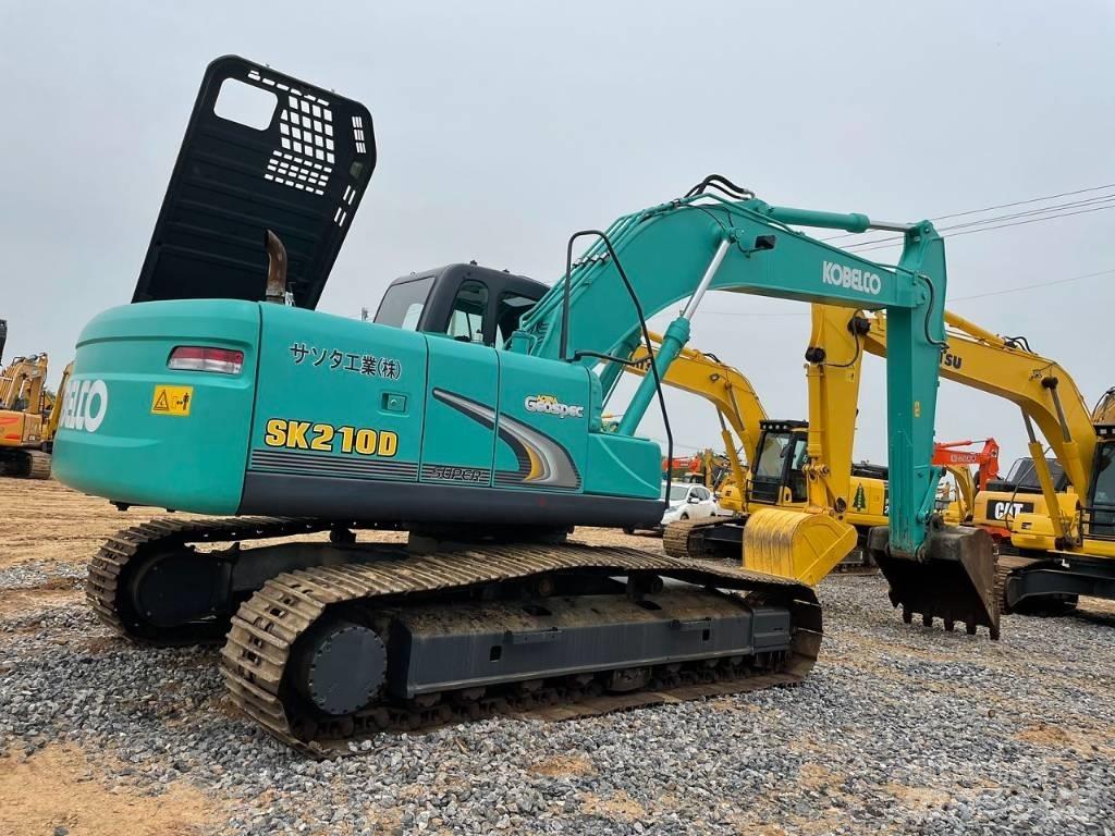 Kobelco SK 210 D حفارات وسط 7 طن - 12 طن