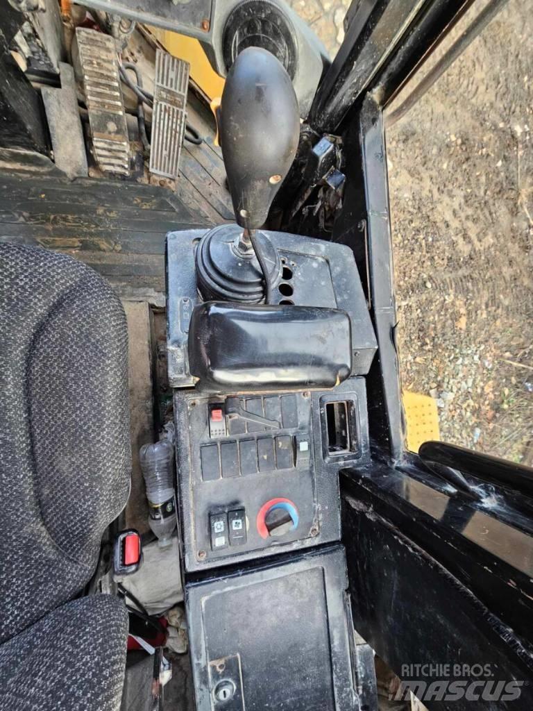 CAT 938 G II لوادر بعجل
