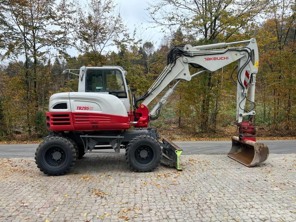 Takeuchi TB 295 W حفارات بعجل