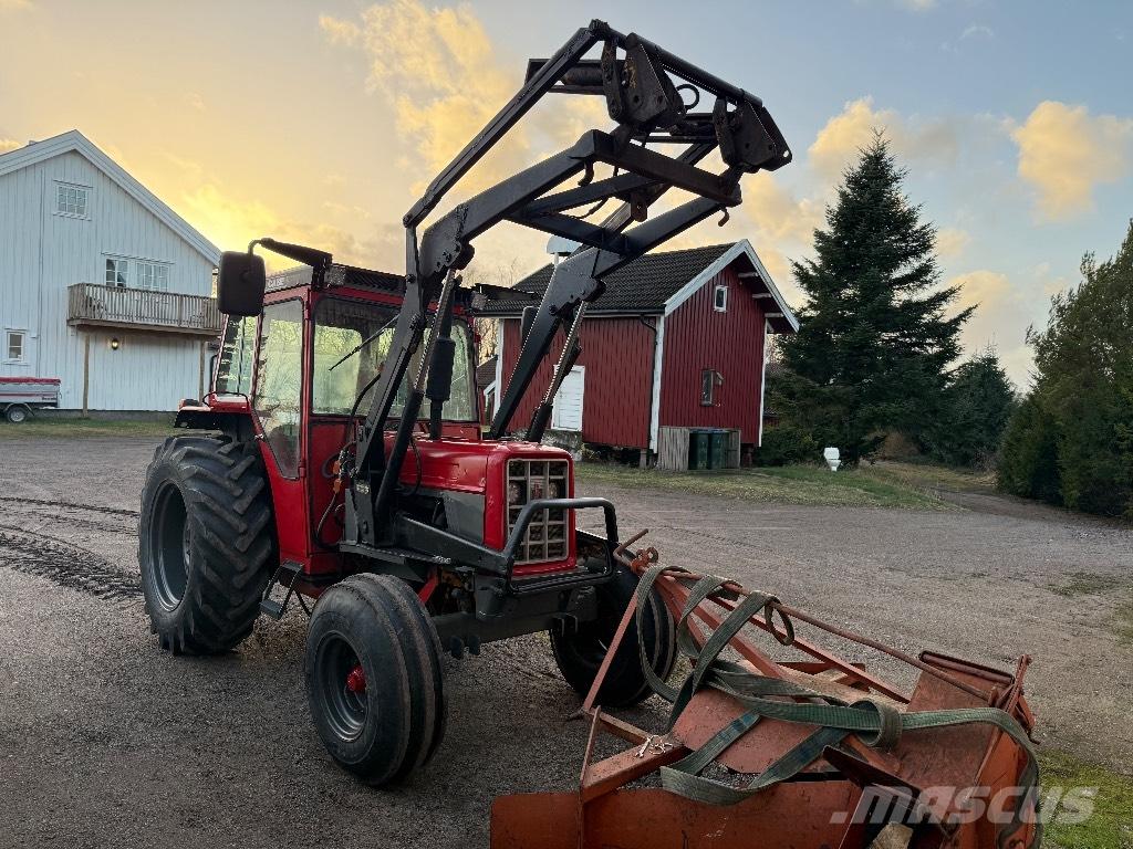 International 574 الجرارات