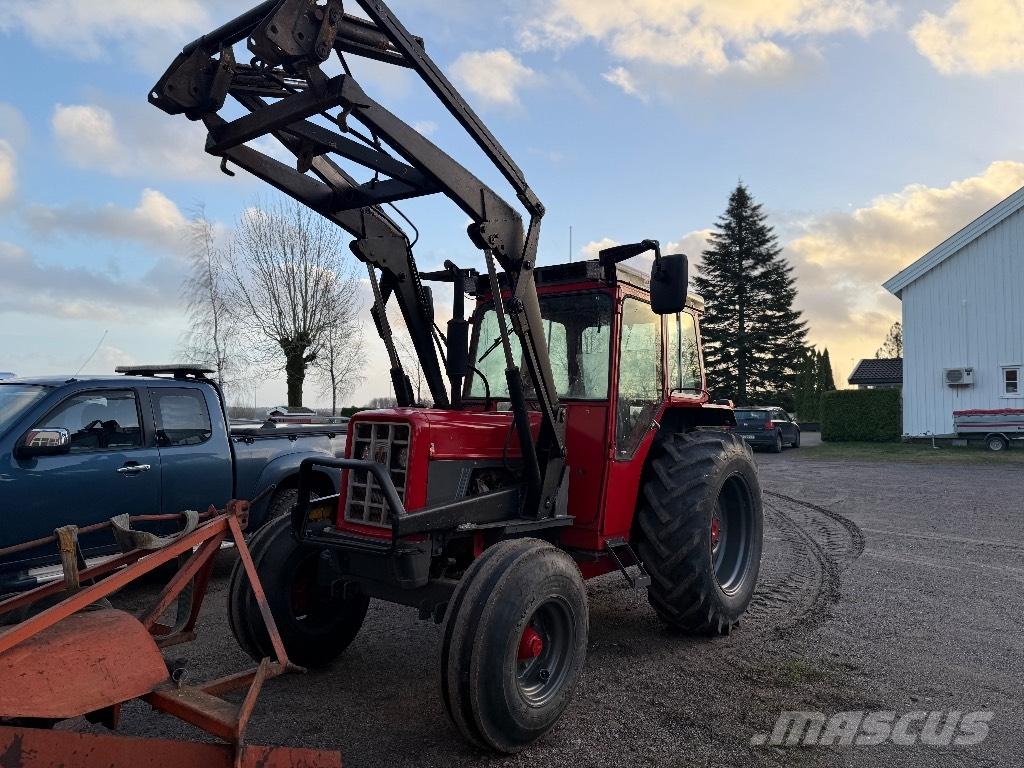 International 574 الجرارات