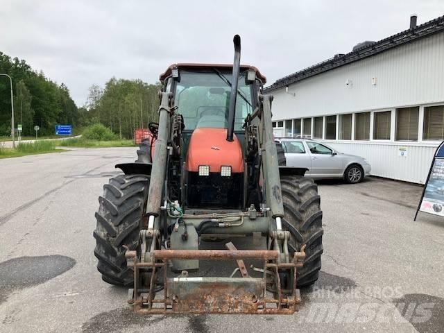 New Holland L 85 الجرارات