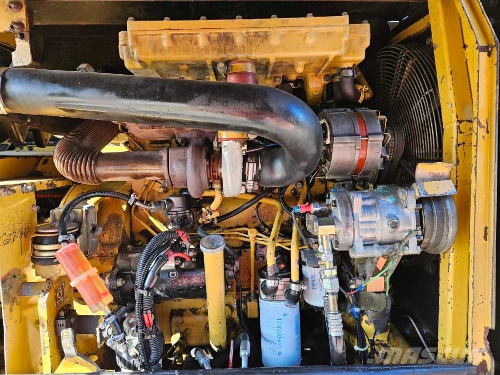 CAT M 312 حفارات بعجل