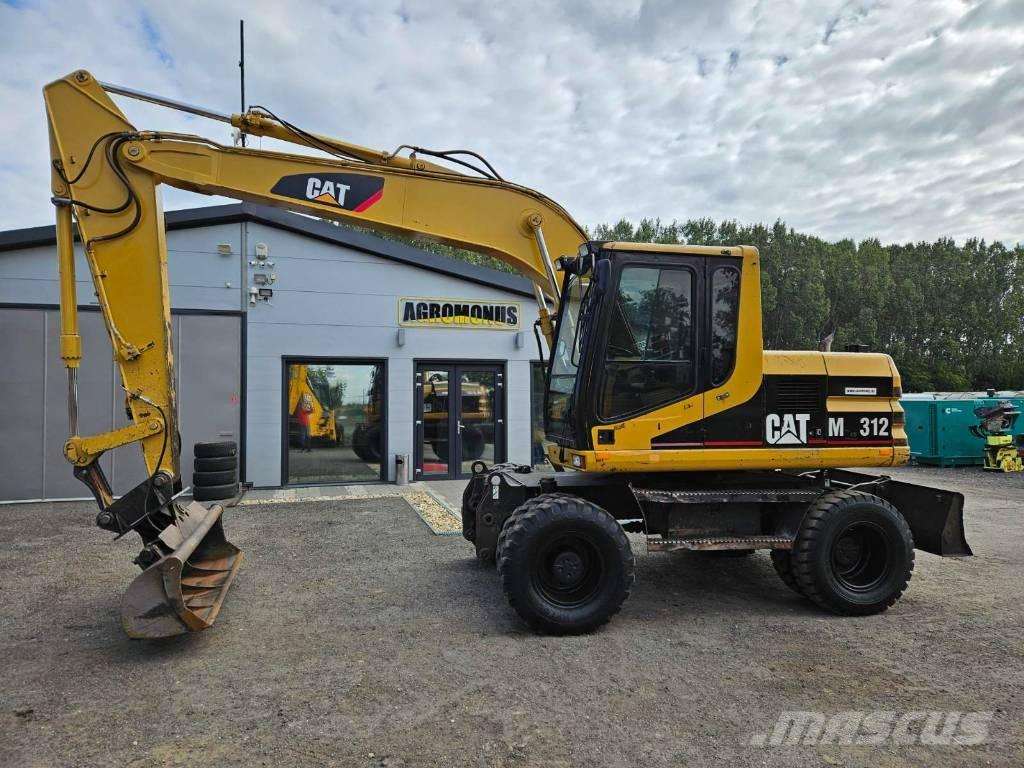 CAT M 312 حفارات بعجل