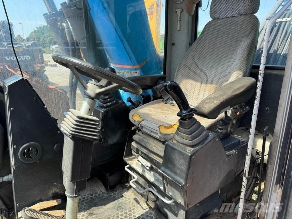 Fuchs MHL 320 مناولات المخلفات / مناولات صناعية