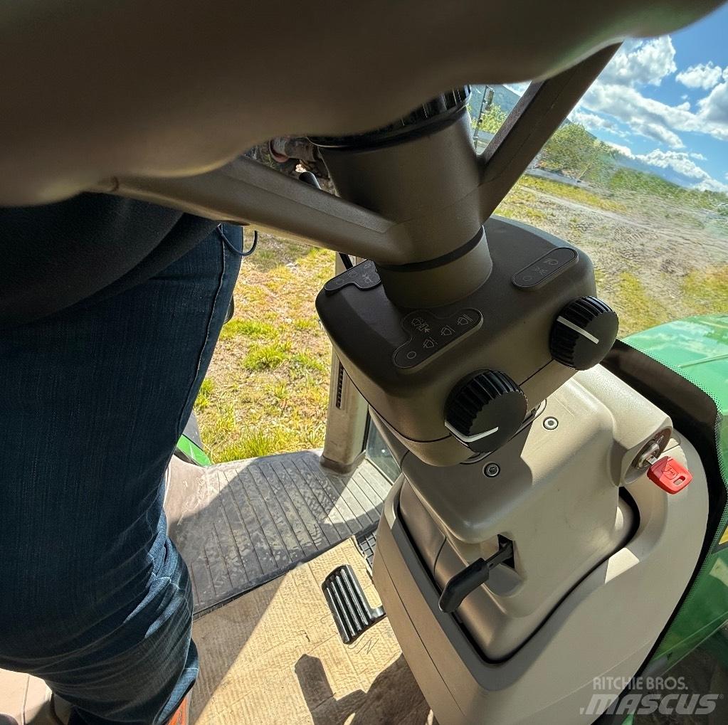 John Deere 8370 R الجرارات