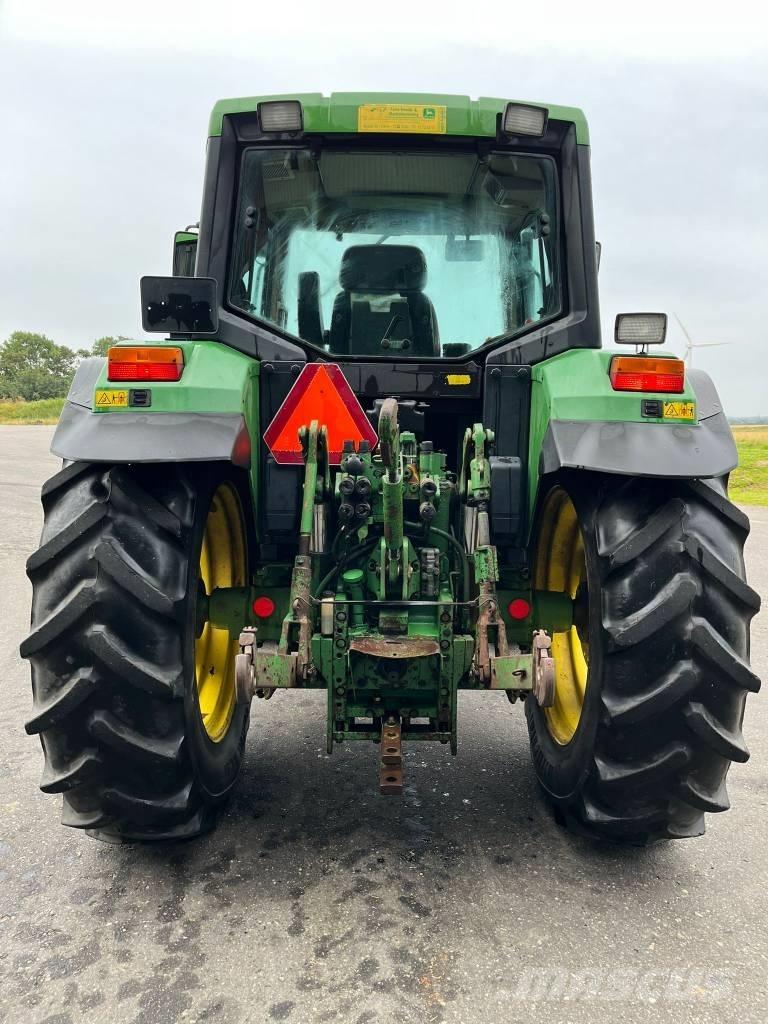 John Deere 6400 الجرارات