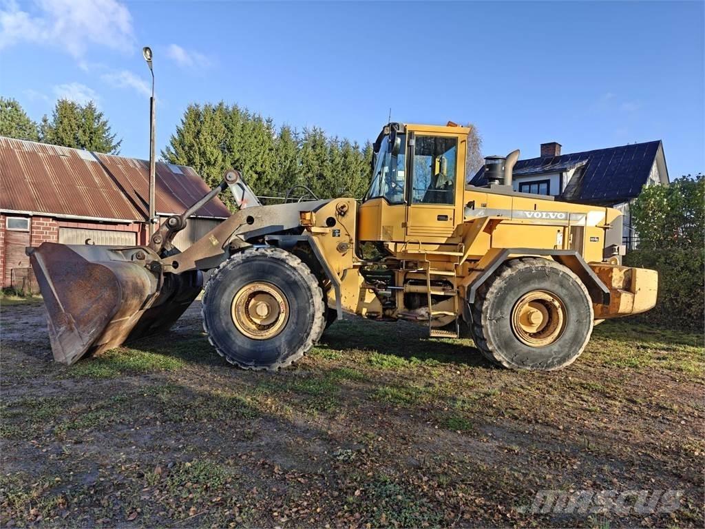 Volvo L180C لوادر بعجل
