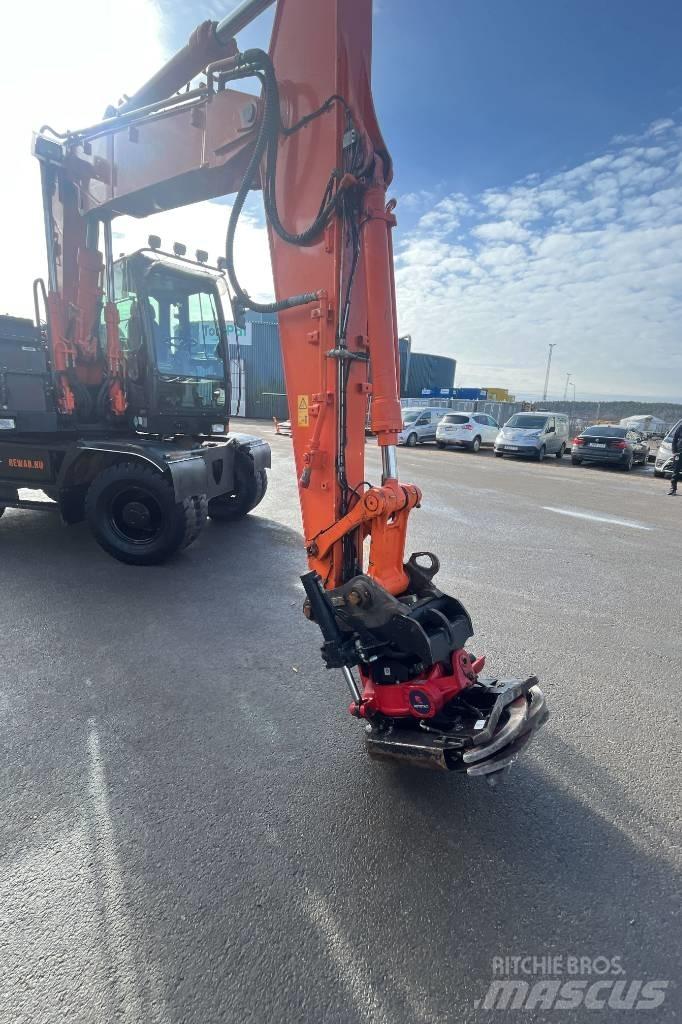 Hitachi ZX 140 W-5B حفارات بعجل