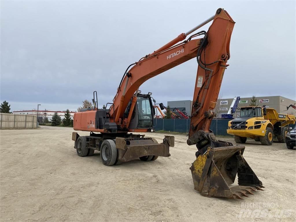 Hitachi ZX210W حفارات بعجل