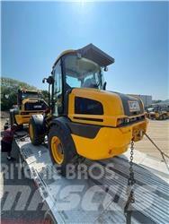 JCB 409 لوادر بعجل