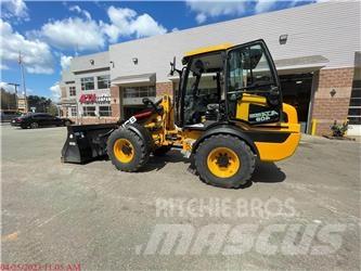 JCB 409 لوادر بعجل