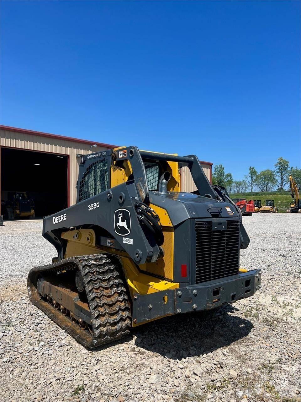 John Deere 333G لوادر انزلاقية التوجيه