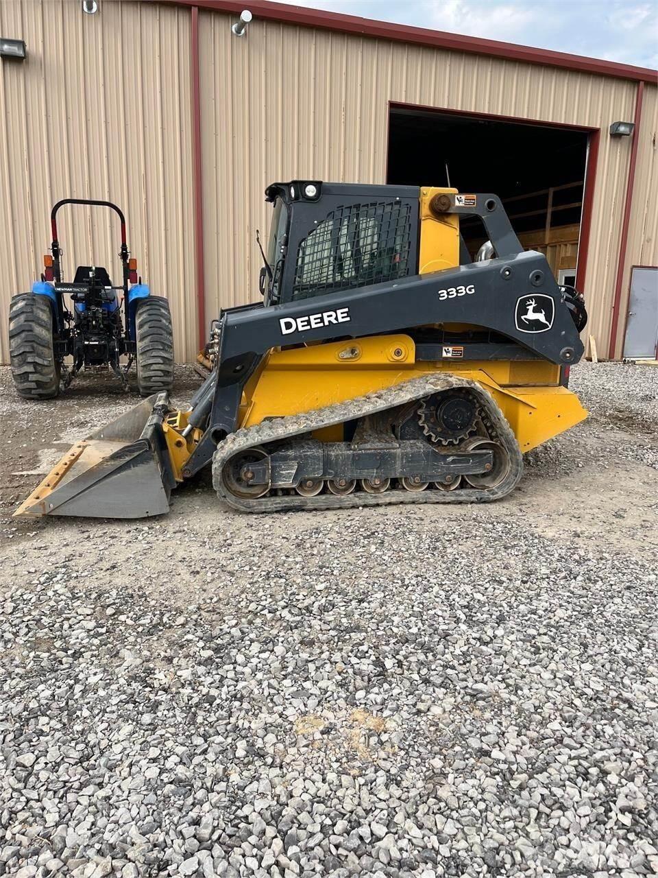 John Deere 333G لوادر انزلاقية التوجيه