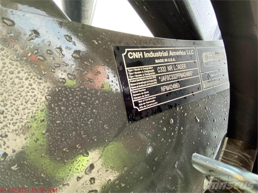 New Holland C332 لوادر انزلاقية التوجيه